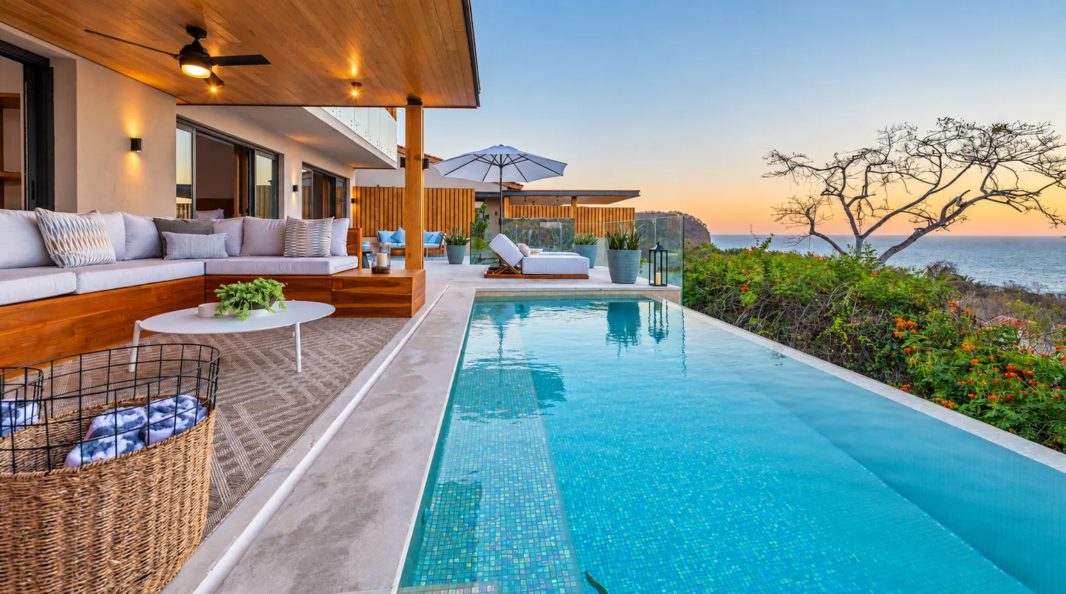 A private pool and shaded villa terrace overlooking the ocean in Punta Mita